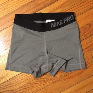 gray and light pink stitching dry fit shorts